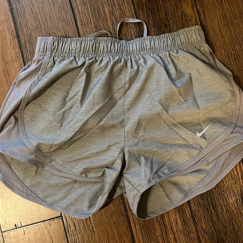 Gray Nike Dri-Fit shorts size small women’s with drawstring inside